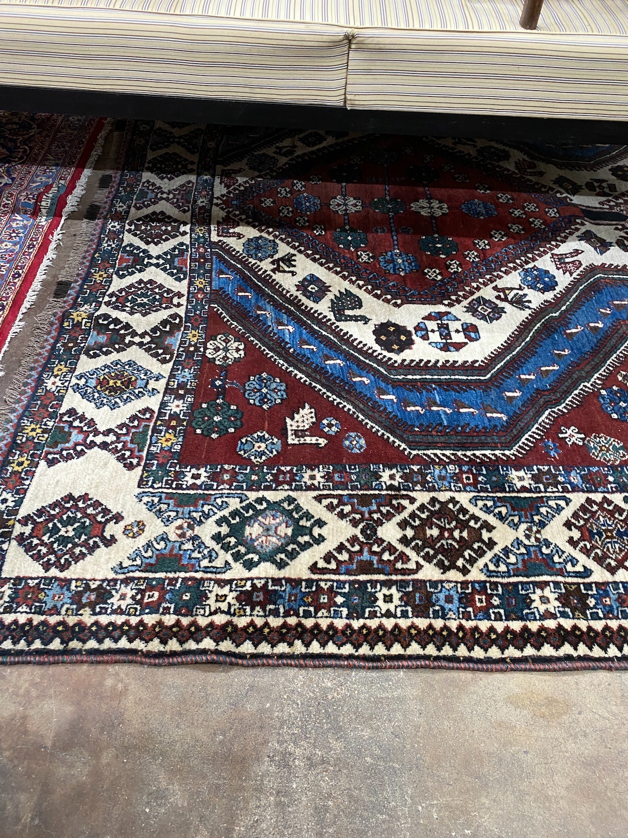 A Shiraz carpet, 338 x 220cm